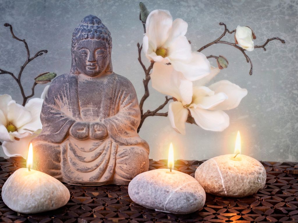 buddha con candele